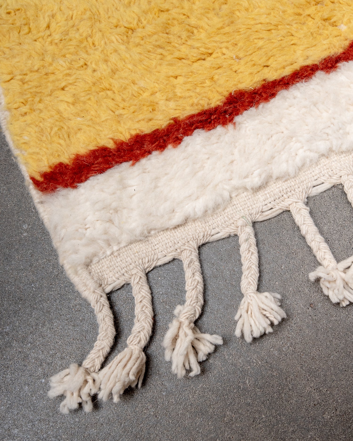 Modern, designer, handcrafted Berber rug from Morocco. Beniourain carpet with beautiful colours and patterns and fluffy wool texture.